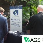 i2 exhibit at AGS banner